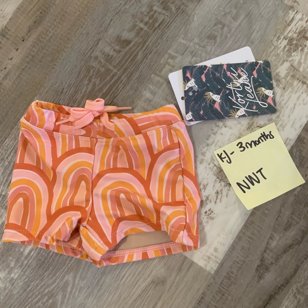 Kortni Jeane Baby boy New Rainbow mini Euro swim bottoms.